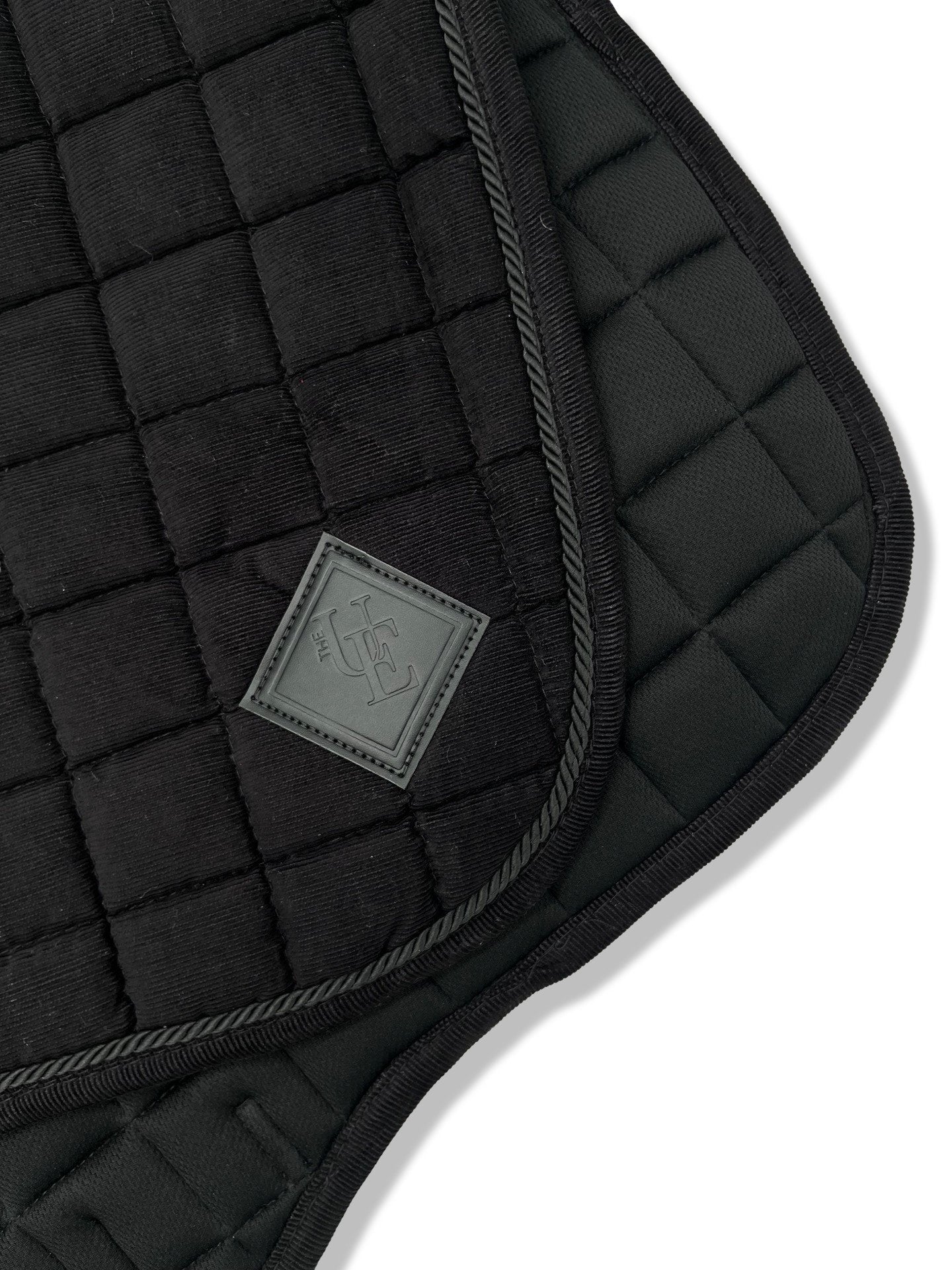 Black Corduroy GP Saddle Pad, from The Urbany. Elevate your horse's style with sparkling crystals and comfort.