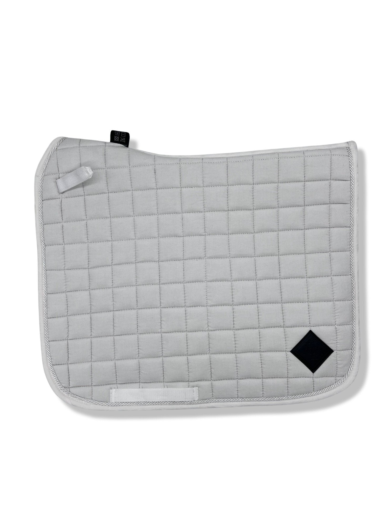 Pearly White Corduroy Dressage Saddle Pad, from The Urbany. Elevate your horse's style with sparkling crystals and comfort.