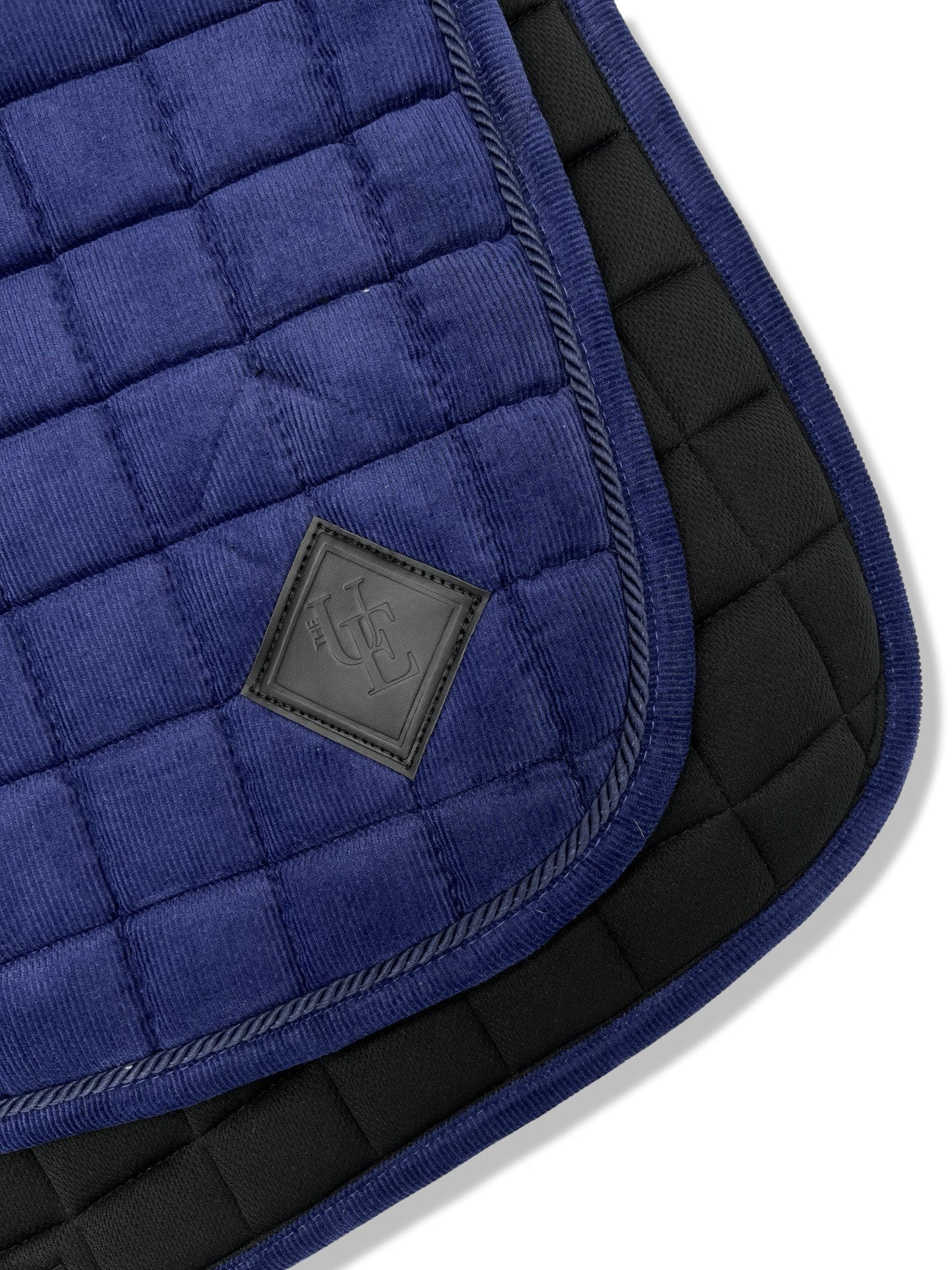 Navy Blue Corduroy Dressage Saddle Pad, from The Urbany. Elevate your horse's style with sparkling crystals and comfort.