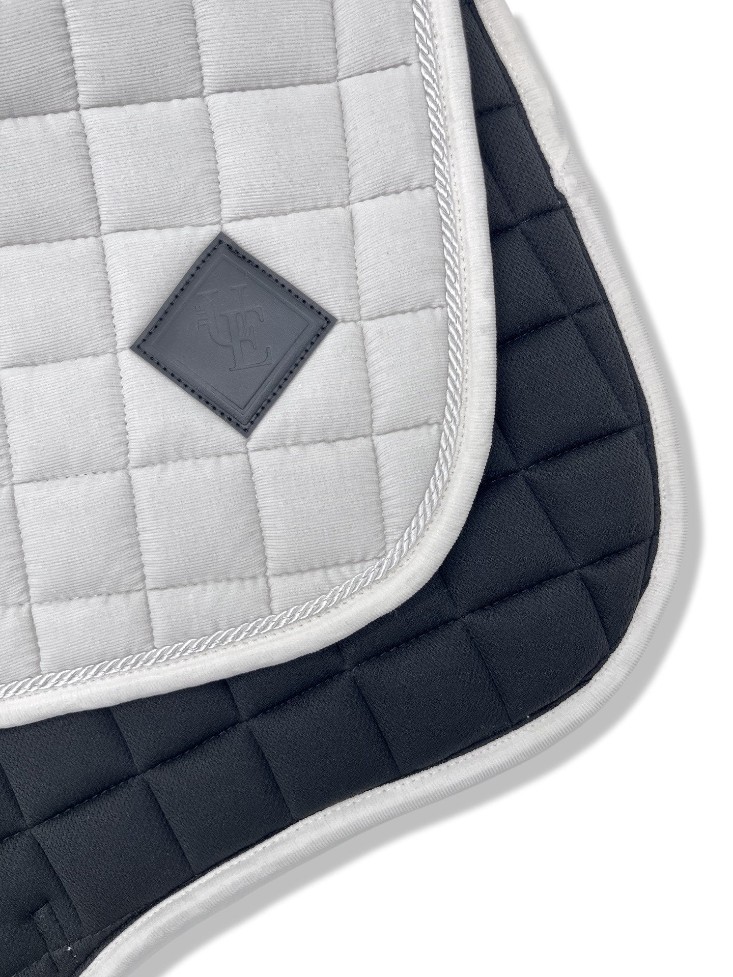 Pearly White Corduroy GP Saddle Pad, from The Urbany. Elevate your horse's style with sparkling crystals and comfort.