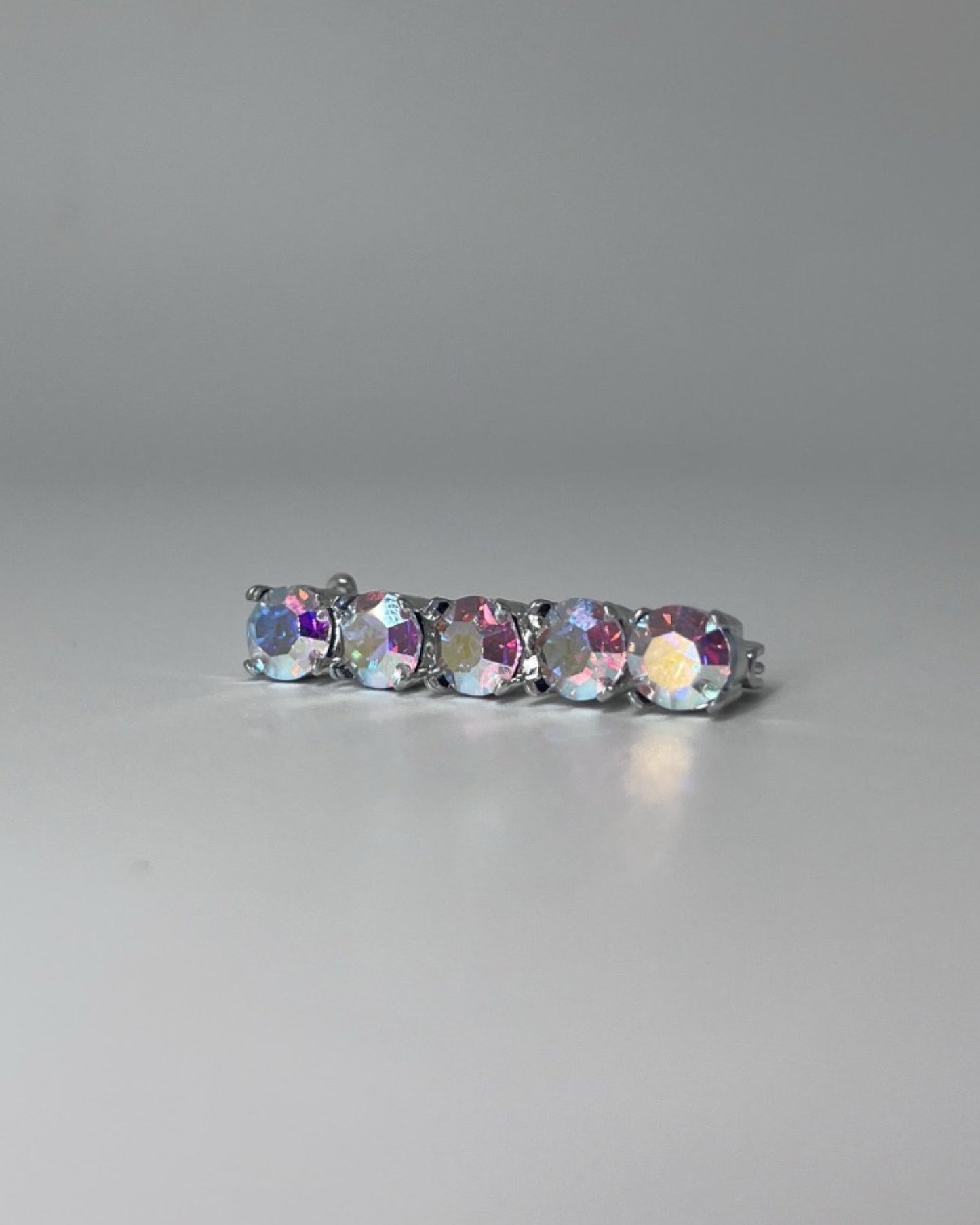 Rainbow Shine Crystal Stock Pin, from The Urbany. Elevate your horse's style with sparkling crystals and comfort.