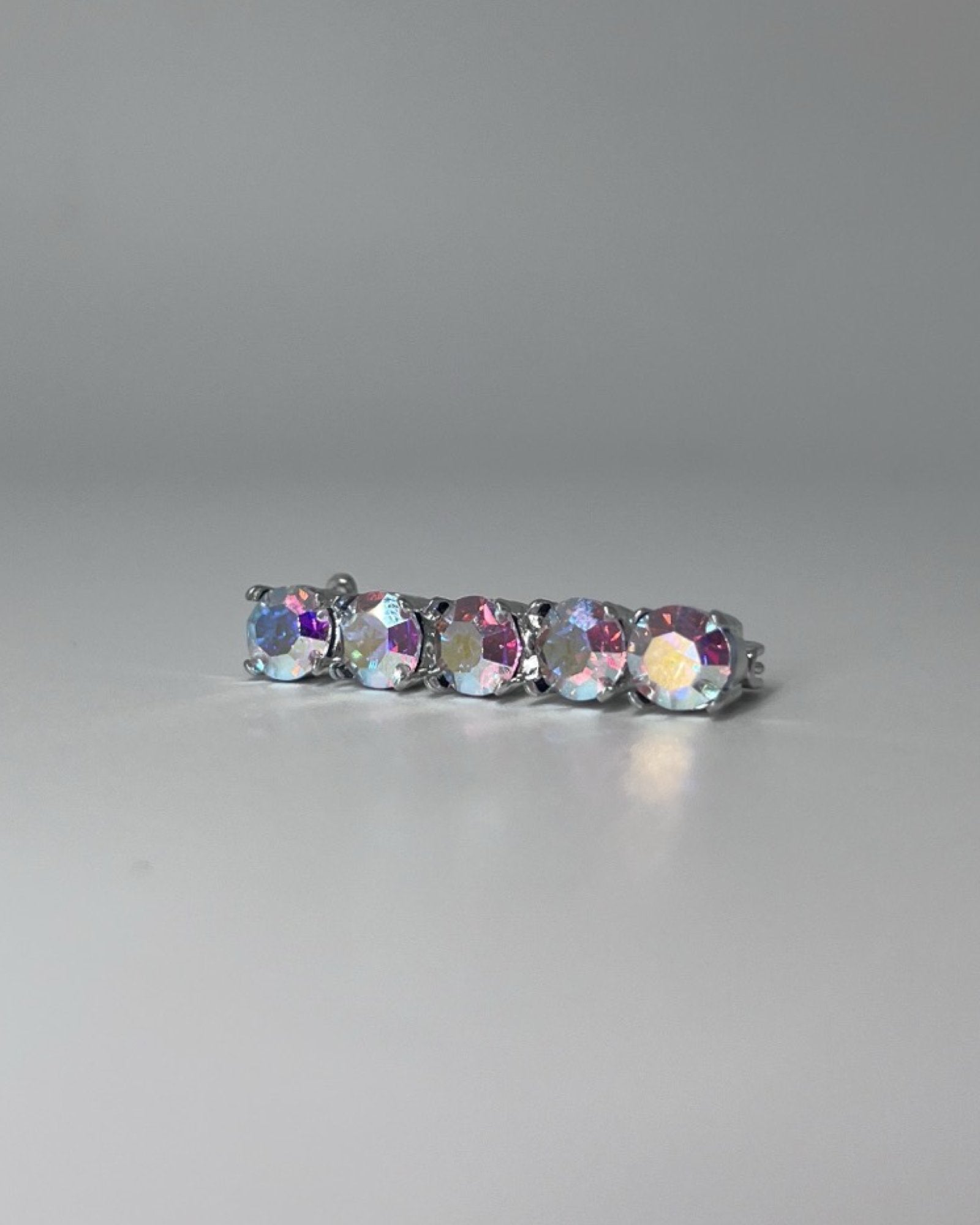 Rainbow Shine Crystal Stock Pin, from The Urbany. Elevate your horse's style with sparkling crystals and comfort.