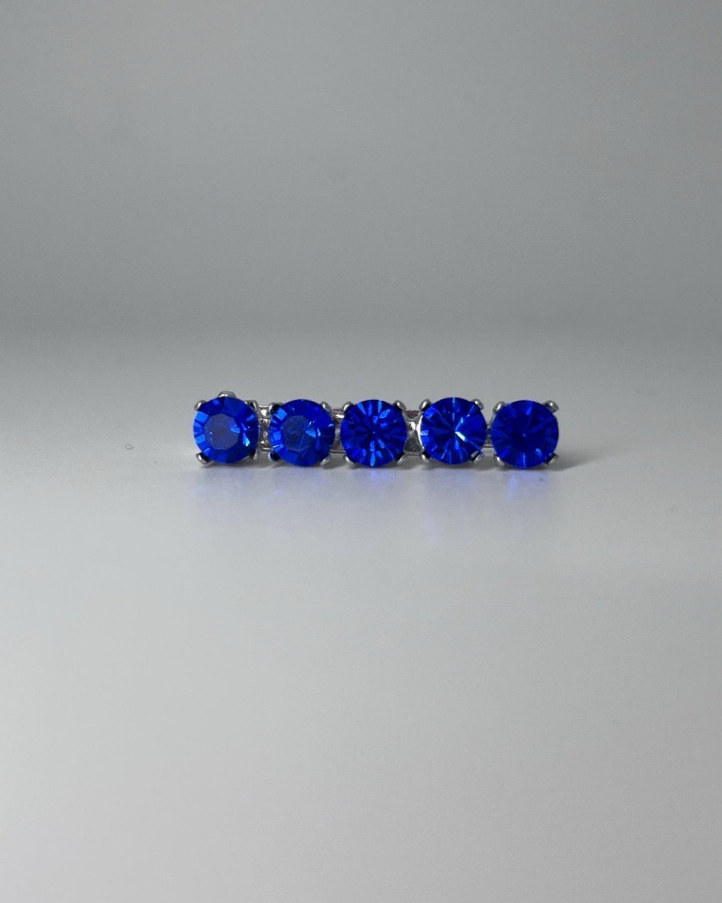 Sapphire Crystal Stock Pin, from The Urbany. Elevate your horse's style with sparkling crystals and comfort.