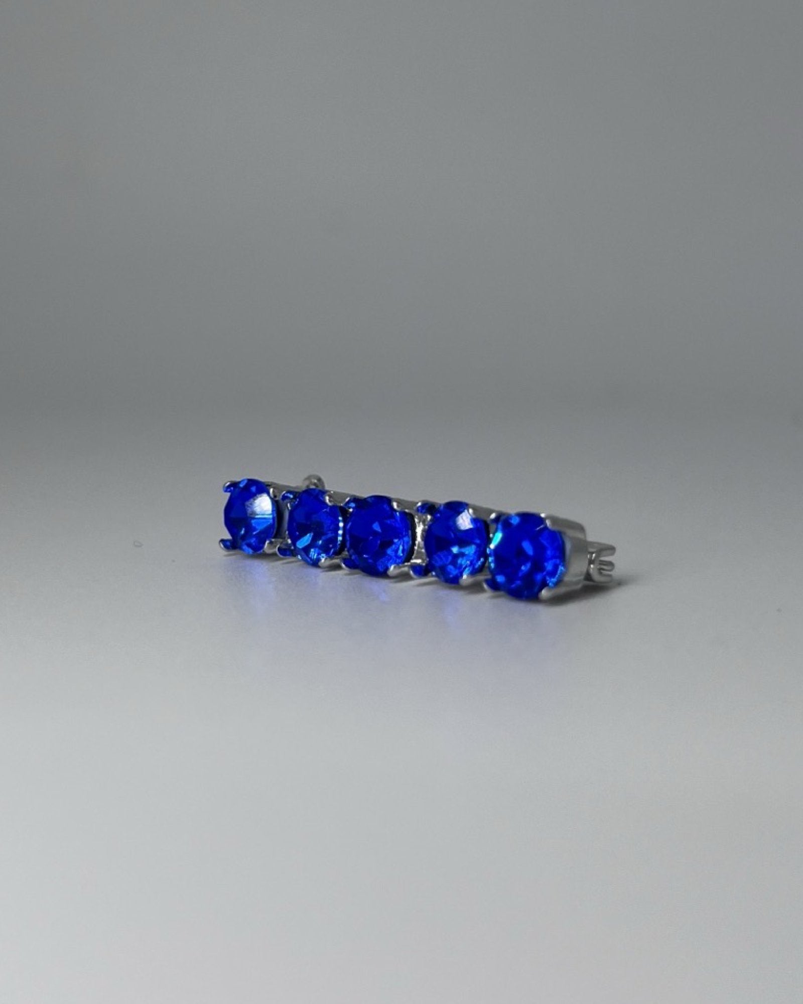 Sapphire Crystal Stock Pin, from The Urbany. Elevate your horse's style with sparkling crystals and comfort.