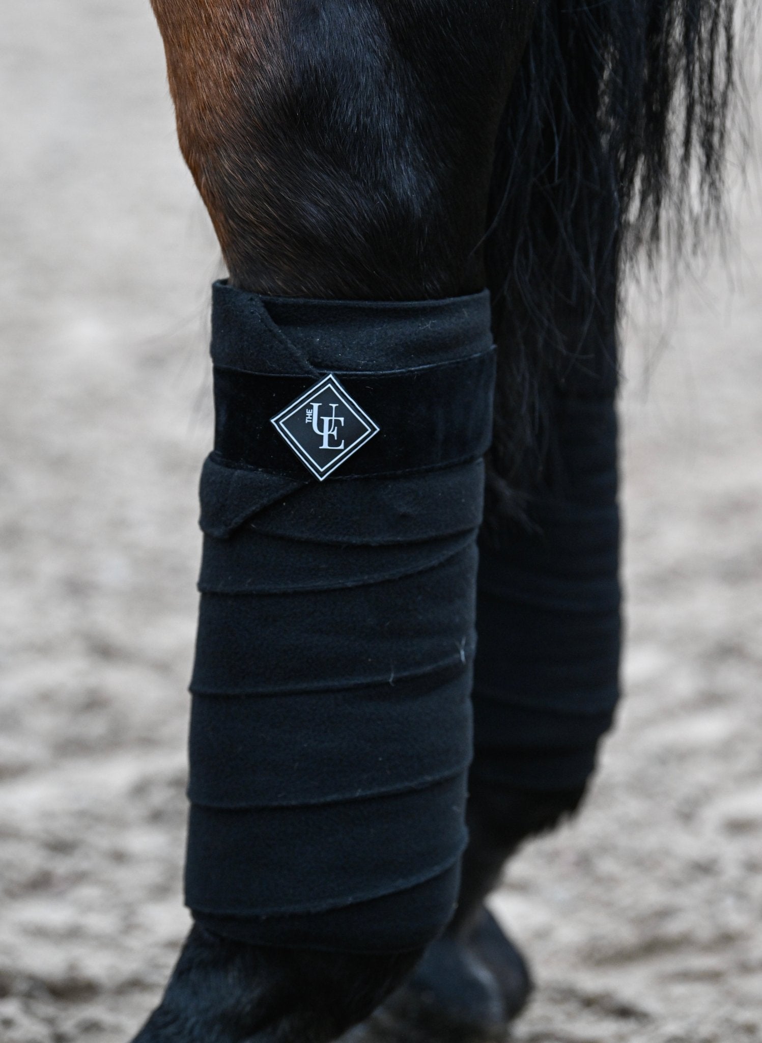 Black Velvet Fleece Bandages, from The Urbany. Elevate your horse's style with sparkling crystals and comfort.