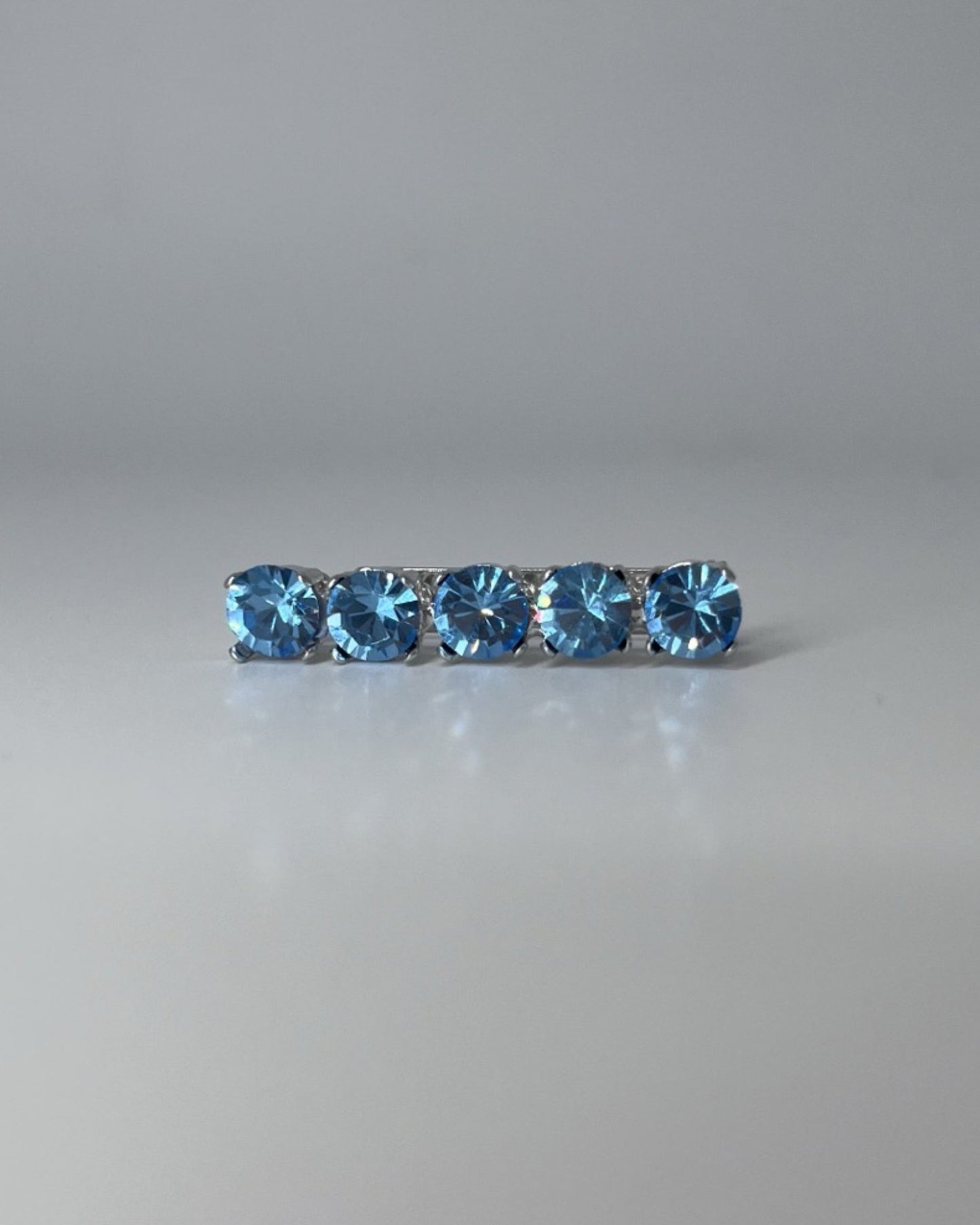 Ocean Blue Crystal Stock Pin, from The Urbany. Elevate your horse's style with sparkling crystals and comfort.