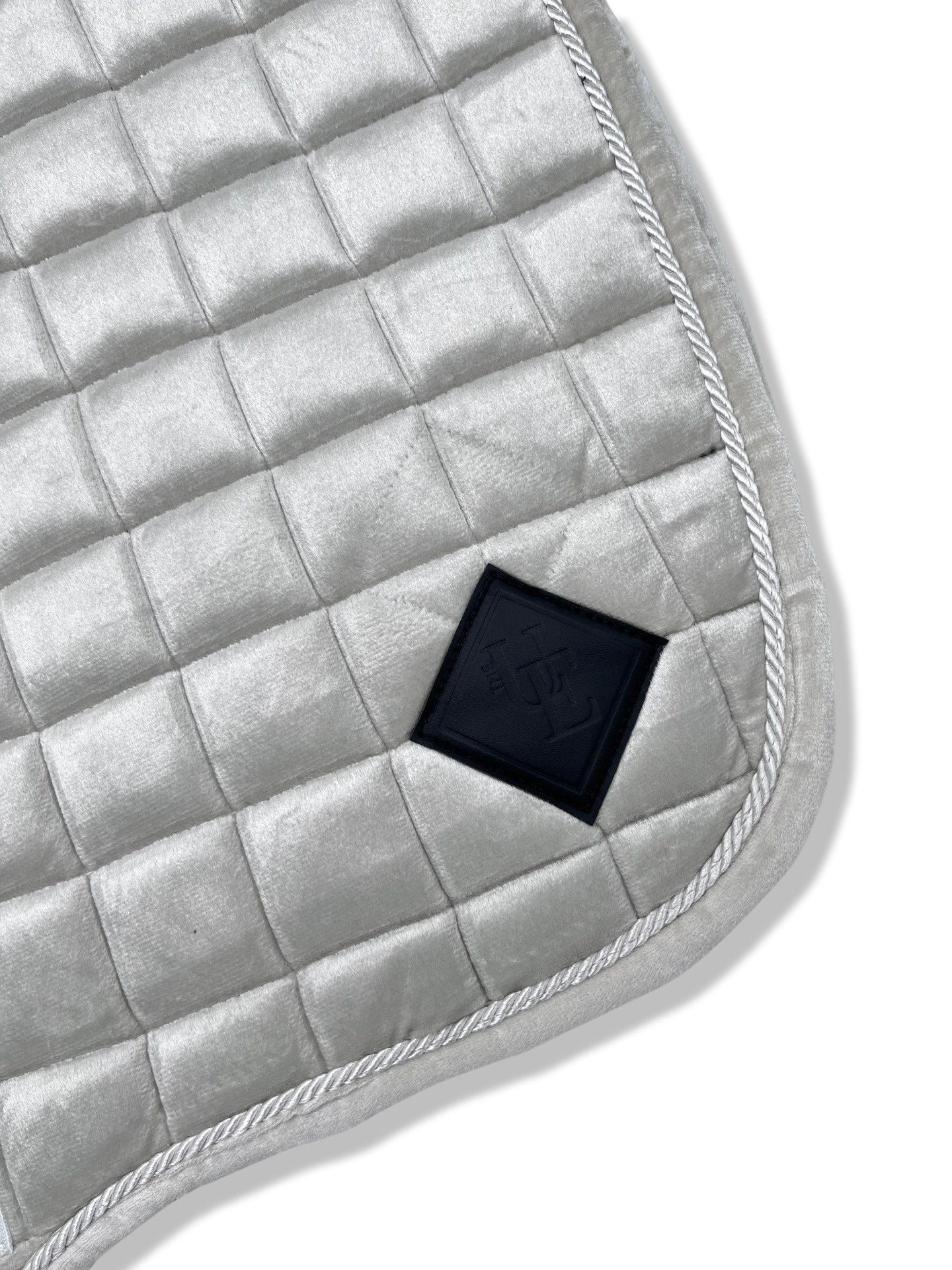 Pearly White Velvet GP Saddle Pad, from The Urbany. Elevate your horse's style with sparkling crystals and comfort.