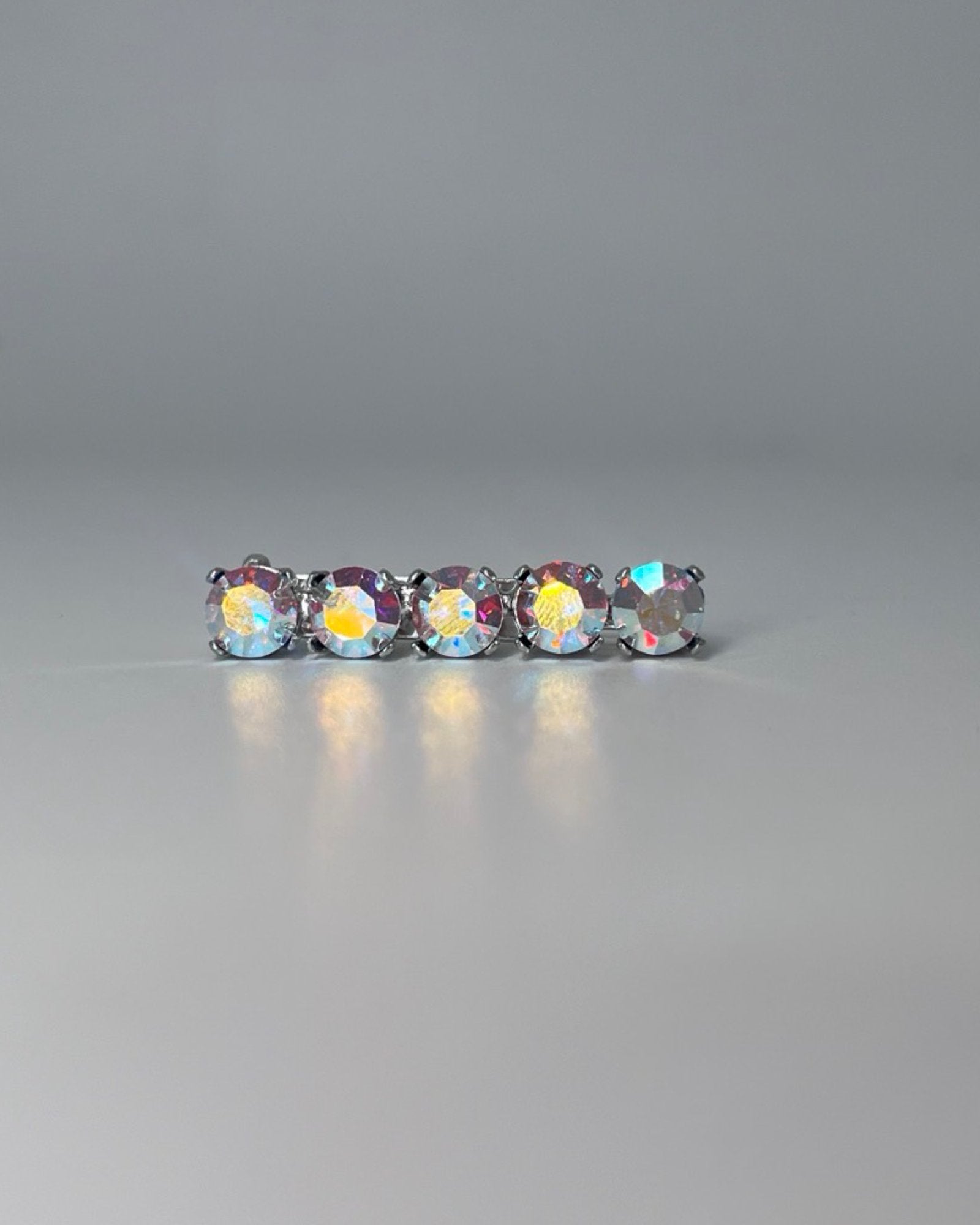 Rainbow Shine Crystal Stock Pin, from The Urbany. Elevate your horse's style with sparkling crystals and comfort.