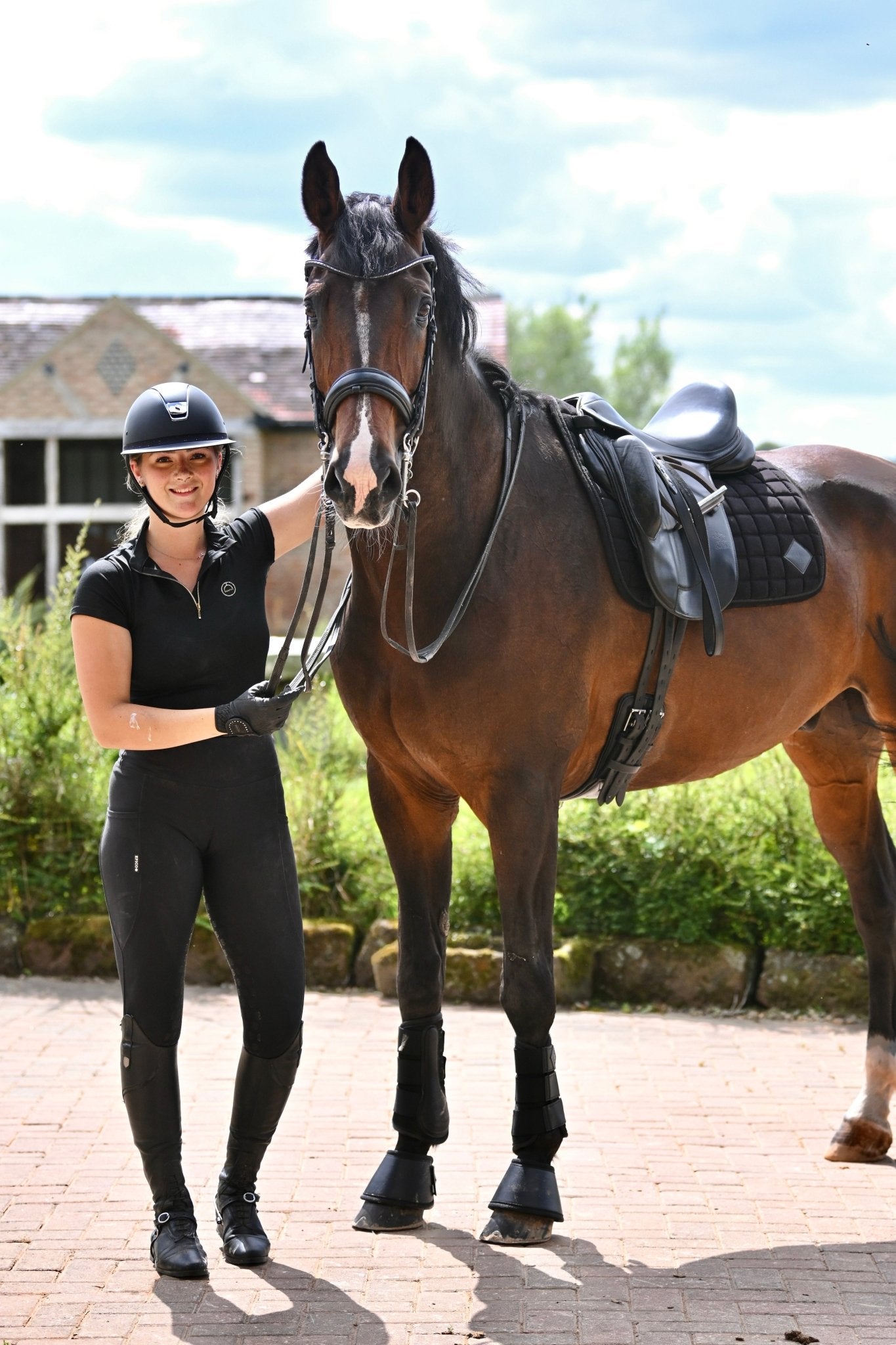 Black Corduroy Dressage Saddle Pad, from The Urbany. Elevate your horse's style with sparkling crystals and comfort.