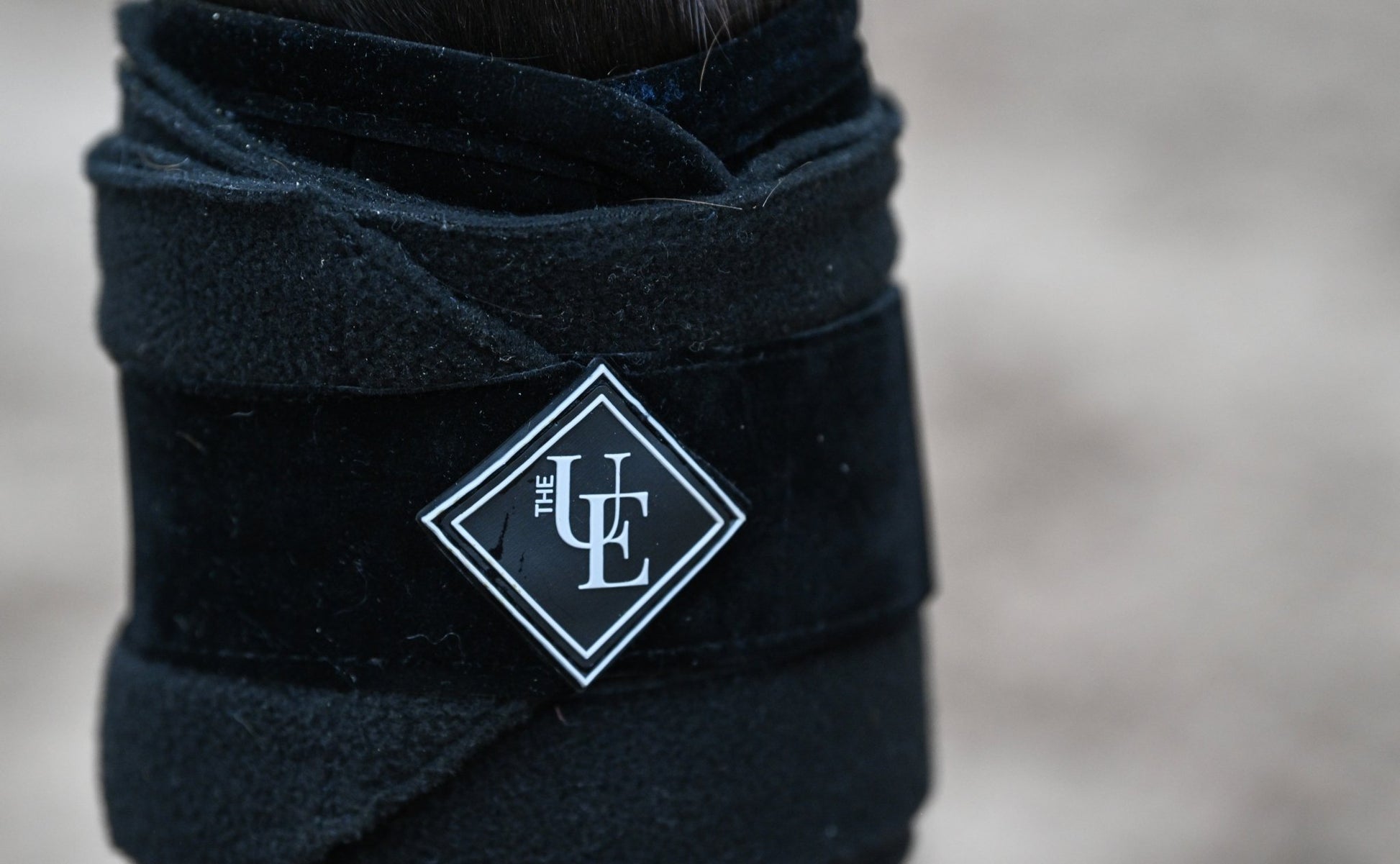 Black Velvet Fleece Bandages, from The Urbany. Elevate your horse's style with sparkling crystals and comfort.