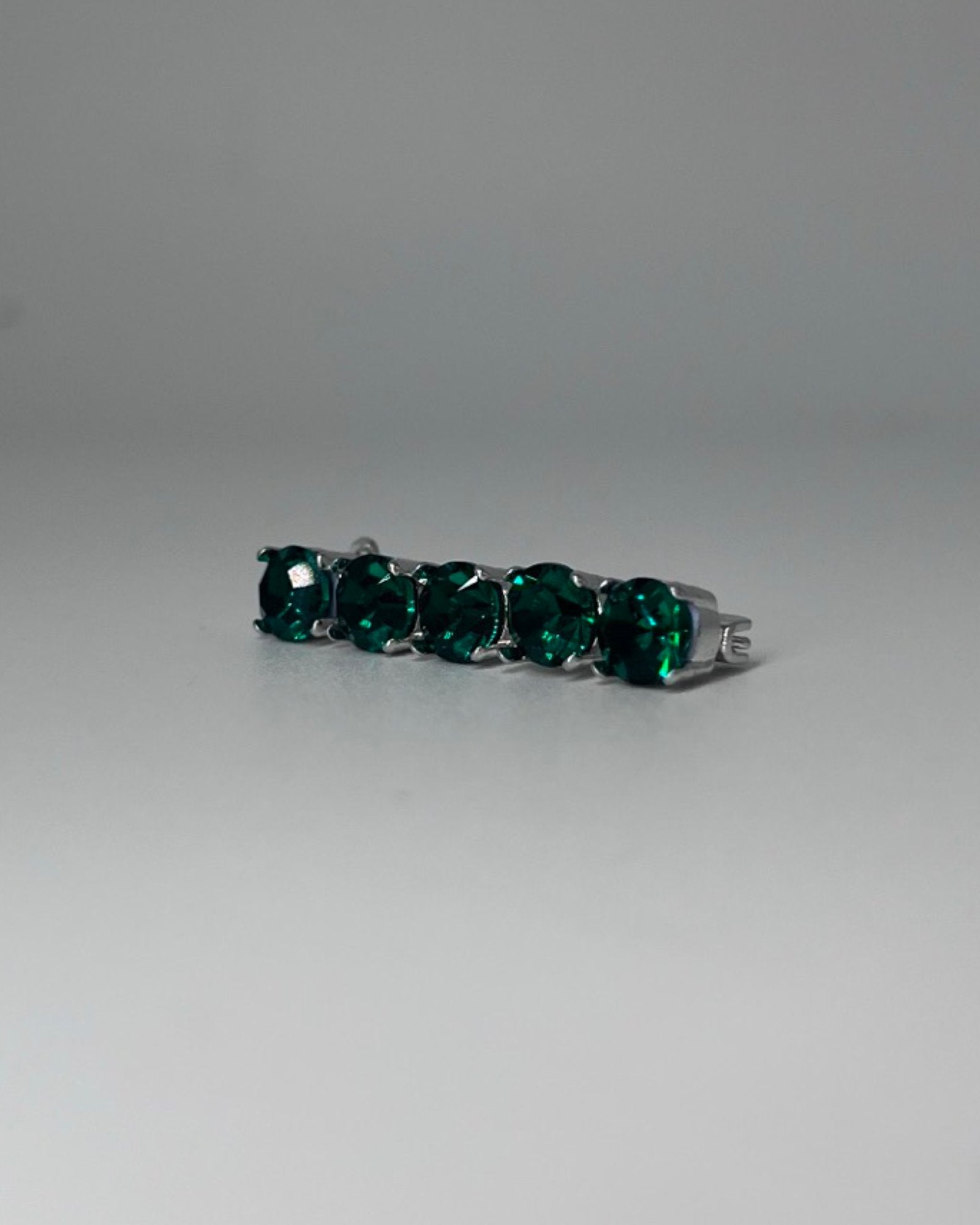 Emerald Crystal Stock Pin, from The Urbany. Elevate your horse's style with sparkling crystals and comfort.