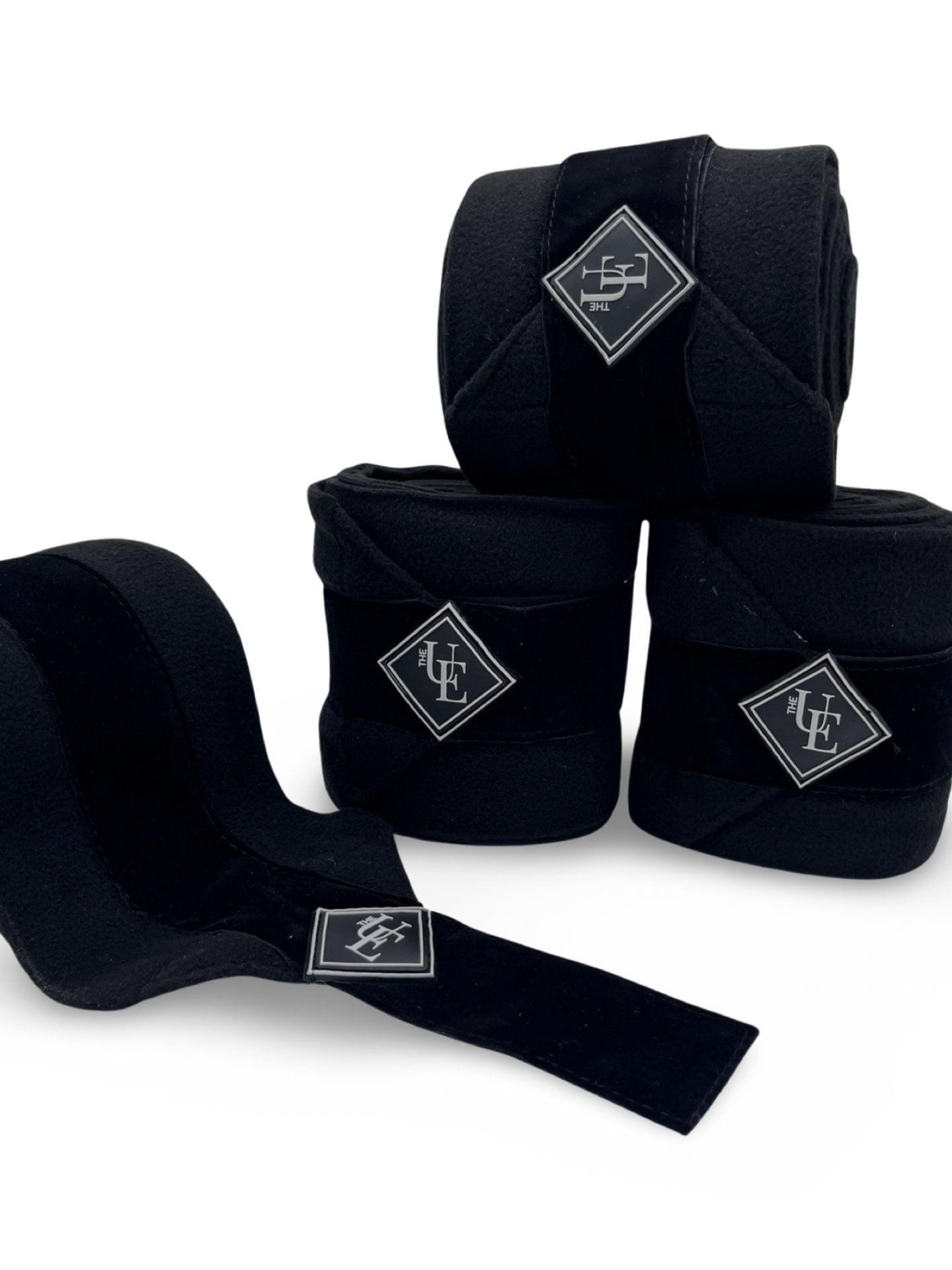 Black Velvet Fleece Bandages, from The Urbany. Elevate your horse's style with sparkling crystals and comfort.