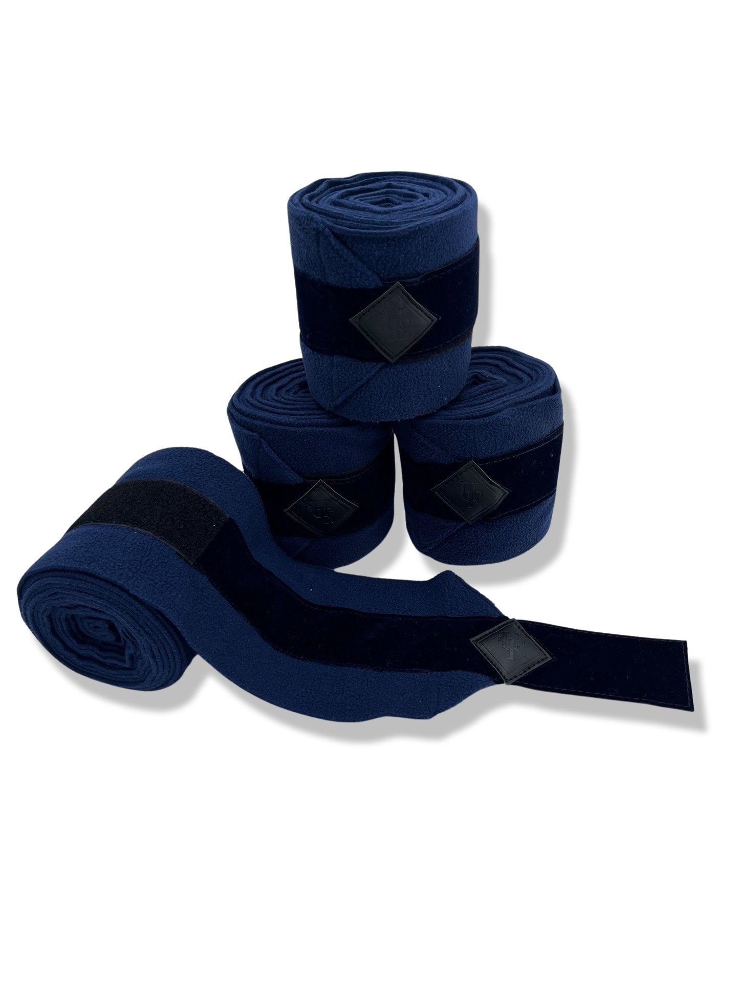 Navy Blue Velvet Fleece Bandages, from The Urbany. Elevate your horse's style with sparkling crystals and comfort.