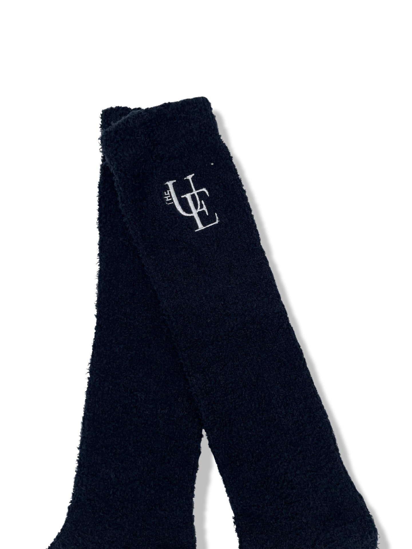 Black Fluffy Long Socks, from The Urbany. Elevate your horse's style with sparkling crystals and comfort.