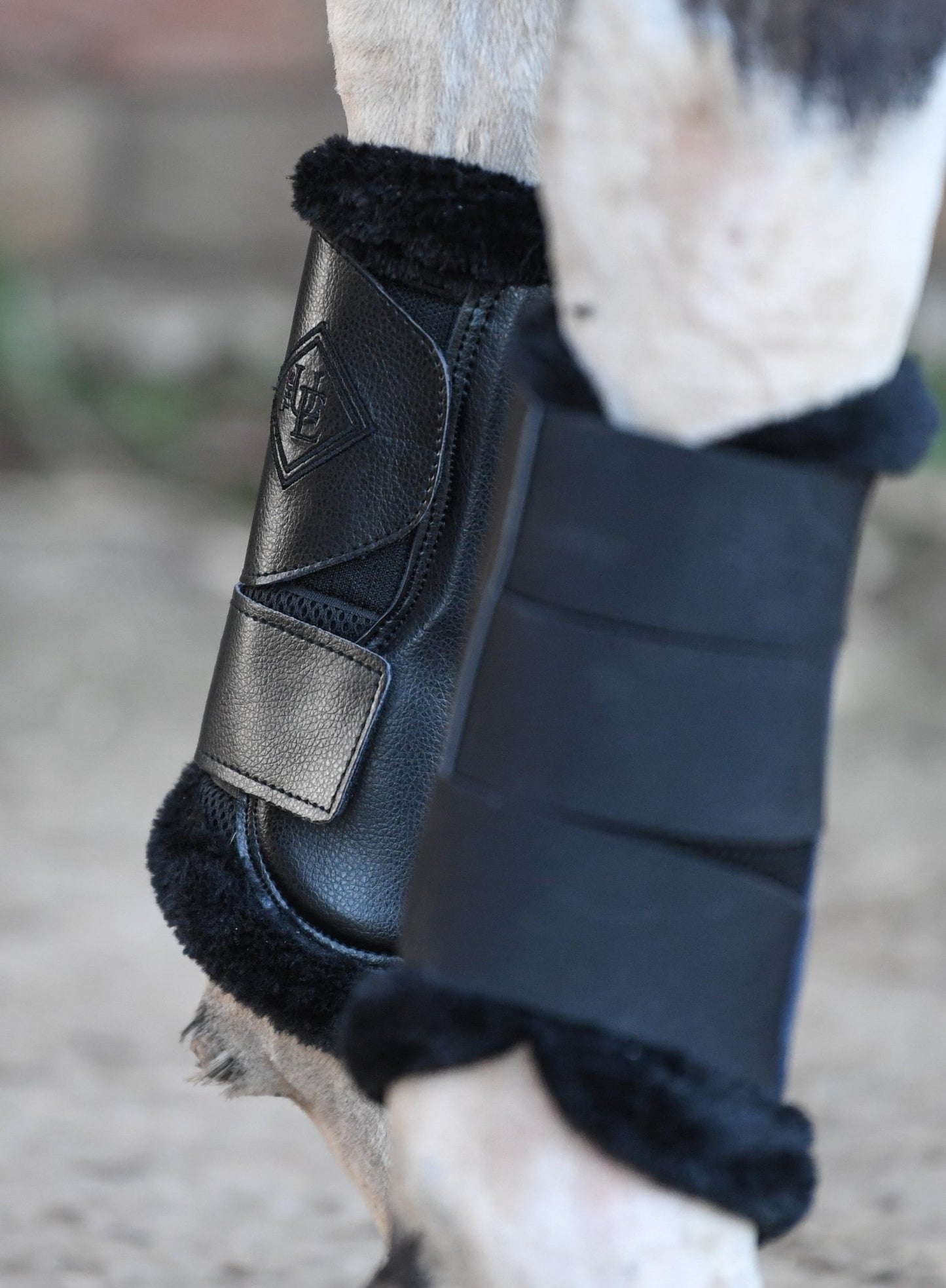 Fleece Trimmed Brushing Boots, from The Urbany. Elevate your horse's style with sparkling crystals and comfort.