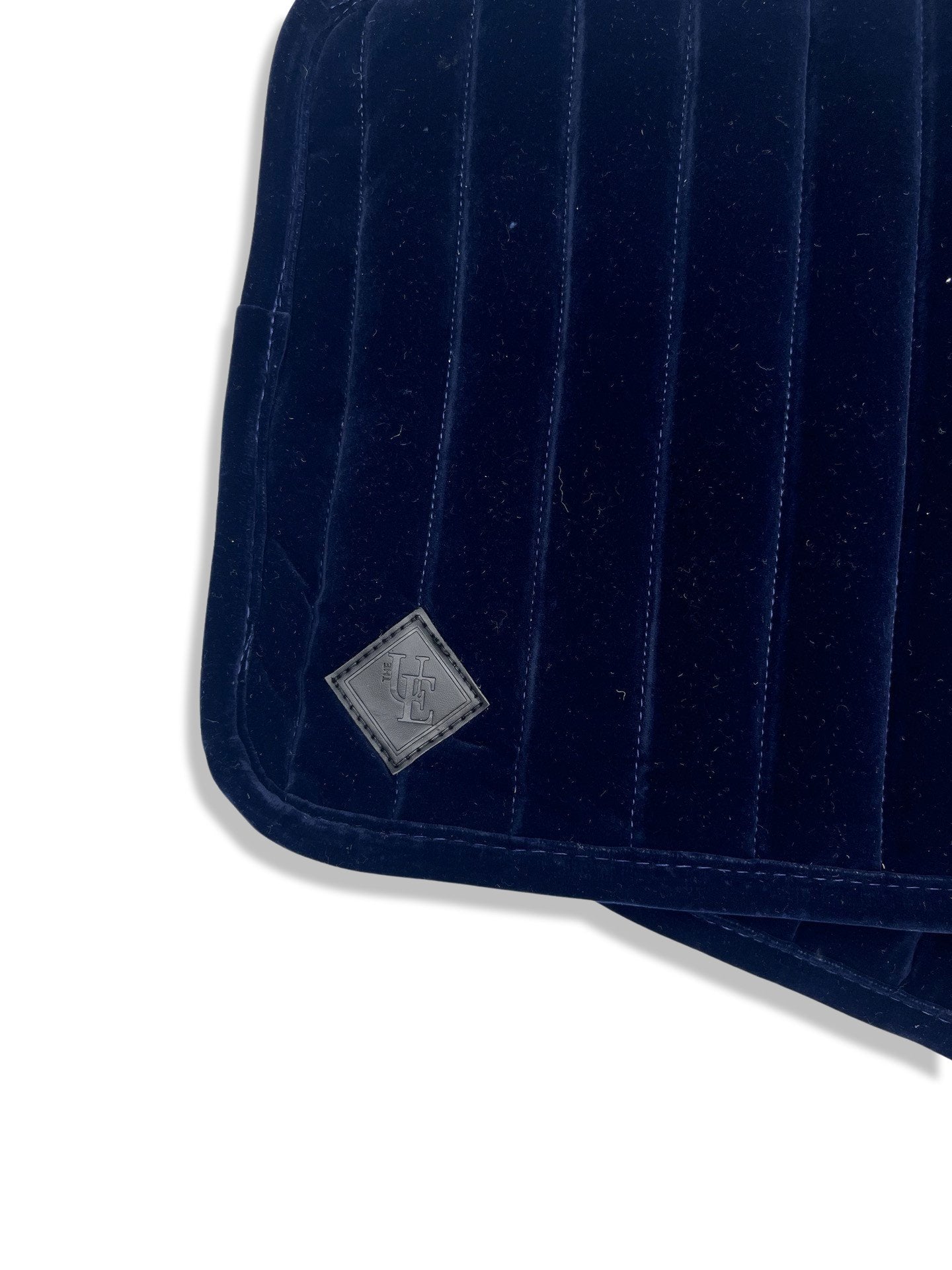 Navy Blue Velvet Bandage Pads, from The Urbany. Elevate your horse's style with sparkling crystals and comfort.