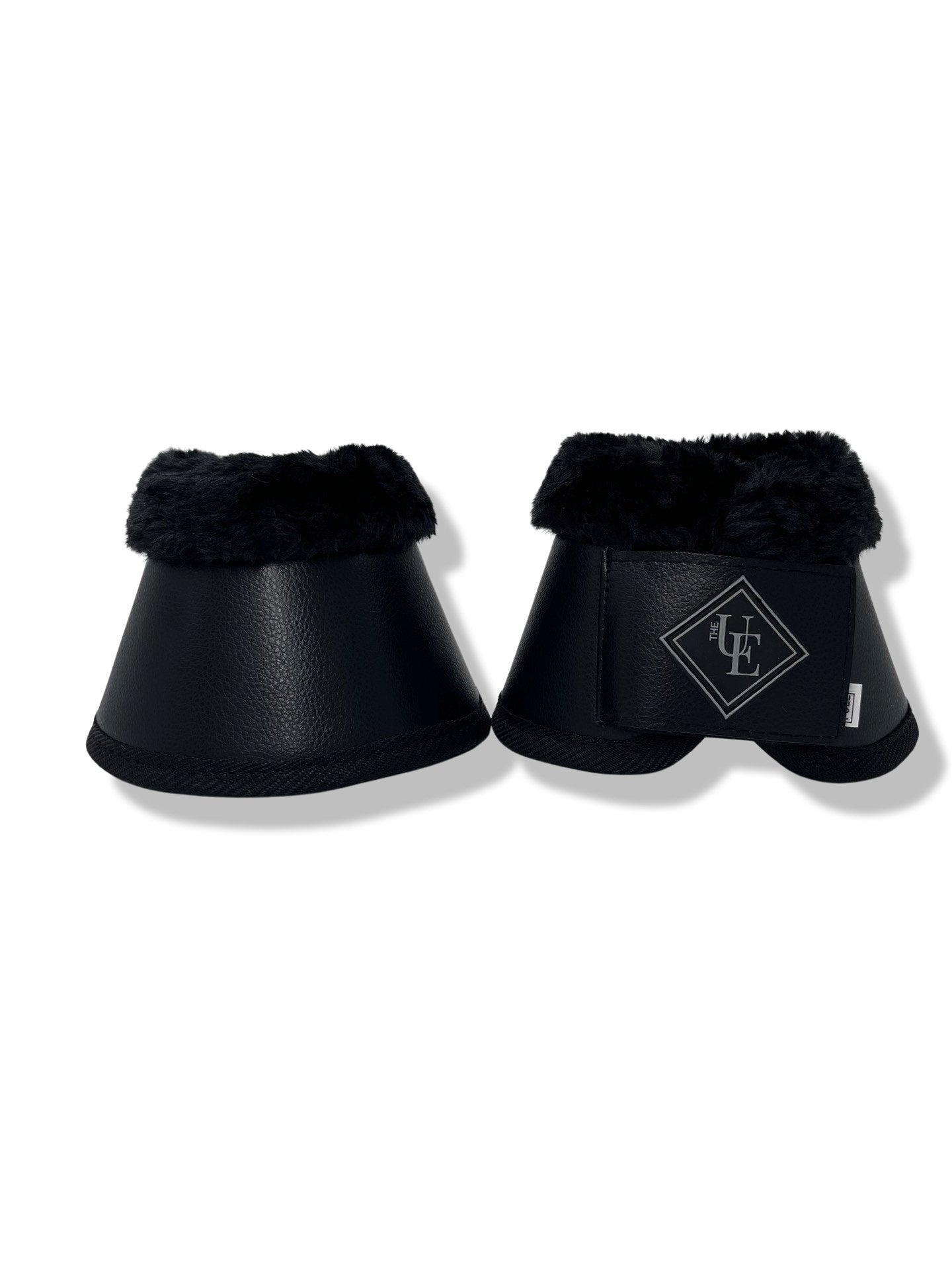 Black Fleece Trimmed Over Reach Boots, from The Urbany. Elevate your horse's style with sparkling crystals and comfort.